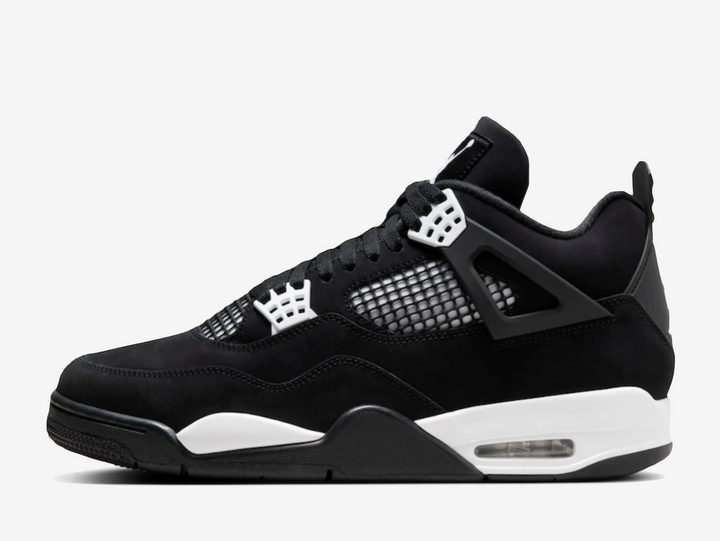 Exclusive Air Jordan 4 sneakers in a black and white colour scheme, featuring a black nubuck upper with white plastic netting on the sides and forefoot.