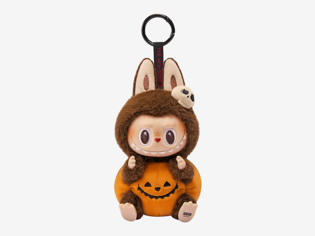 Add a touch of spooky charm to your collection with the Pop Mart Labubu Sitting Pumpkin Vinyl Plush Pendant. This adorable pendant features Labubu sitting snugly inside a cute pumpkin, combining Pop Mart’s signature playful design with Halloween vibes you can enjoy year-round.