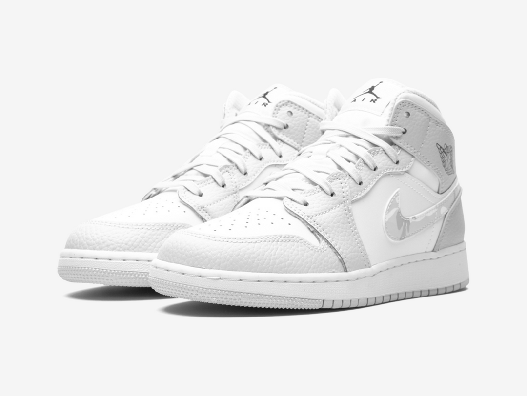 Timeless Air Jordan 1 Mid sneakers in a classic grey and white colour scheme.