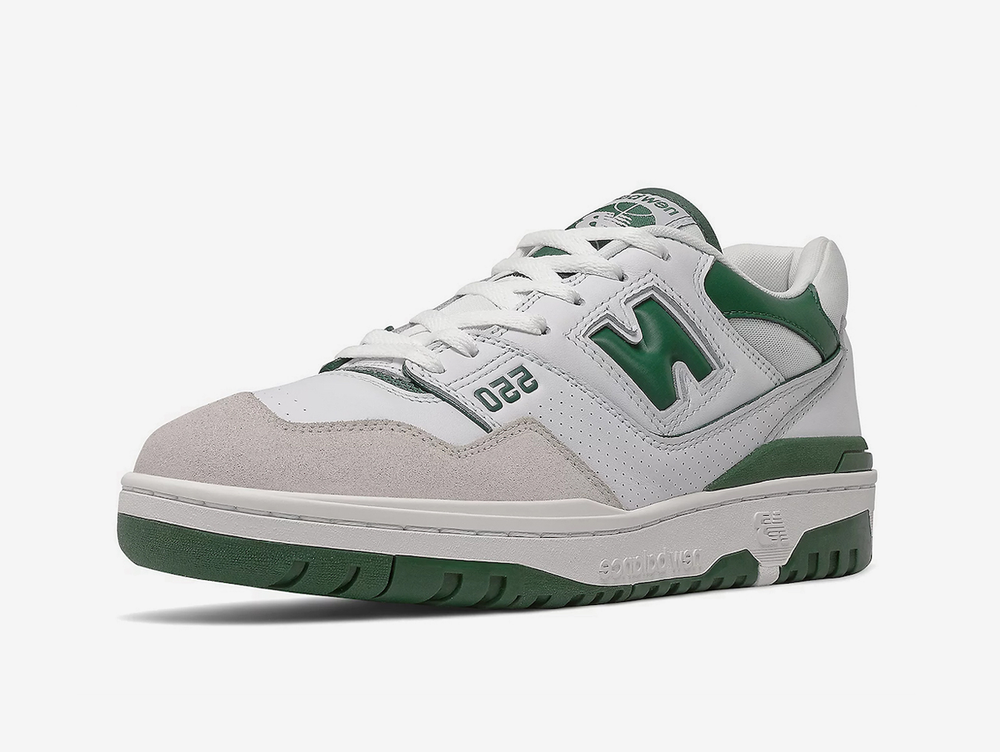 Classic New Balance shoes with a white and green colourway.
