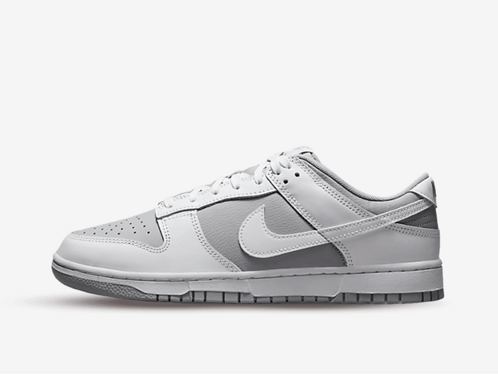Classic Nike Dunk shoes with a white and grey colourway.