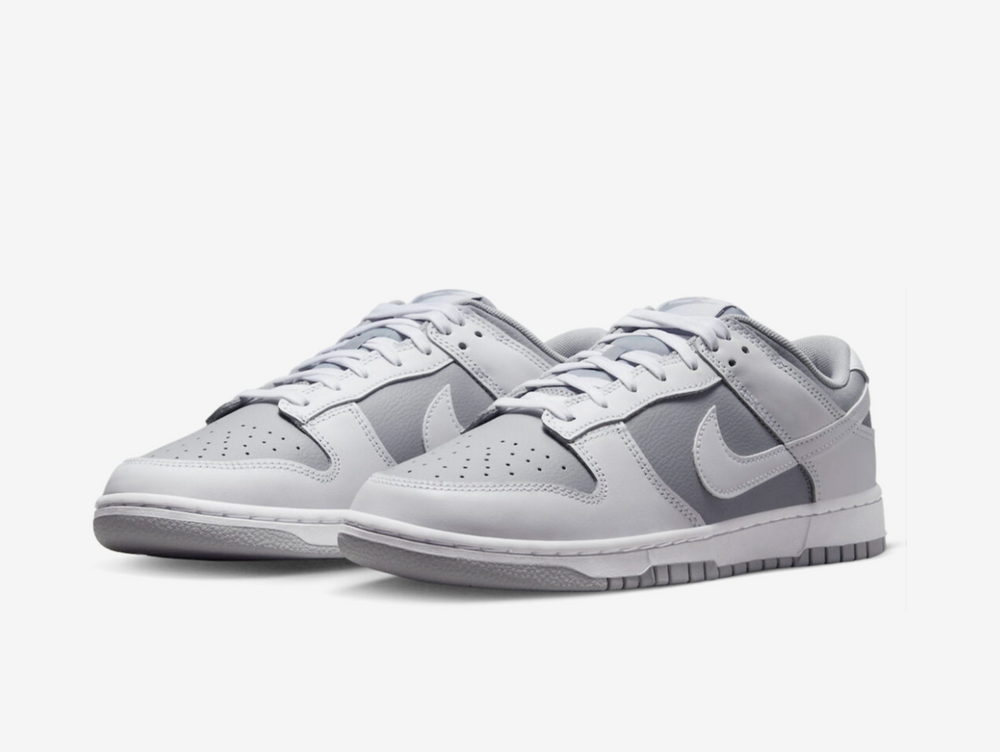 Classic Nike Dunk shoes with a white and grey colourway.