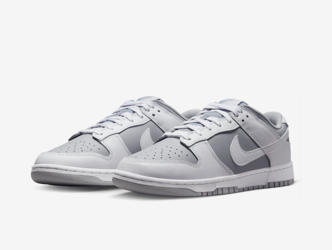 Classic Nike Dunk shoes with a white and grey colourway.