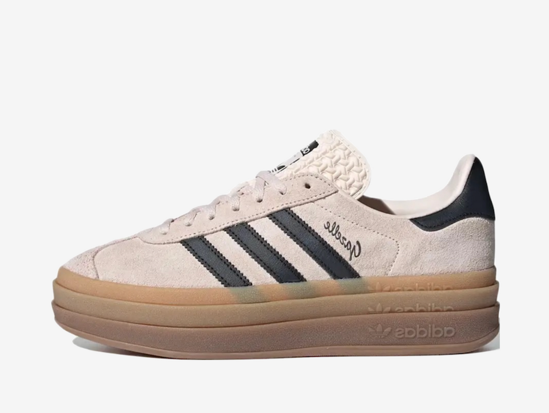 Exclusive Adidas Gazelle sneakers in an off white, black and gum colourway.
