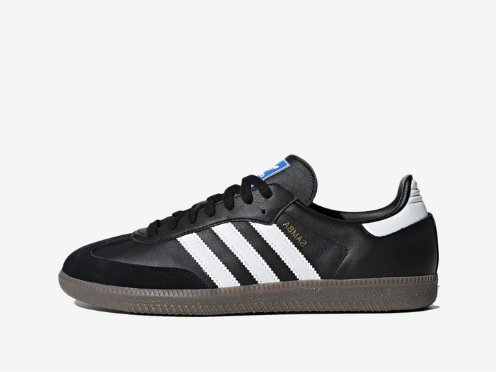 Classic Adidas sneakers in a black and white colourway.