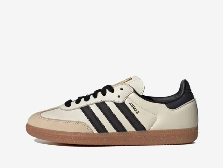 Exclusive Adidas Samba trainers in a cream and black colour scheme.