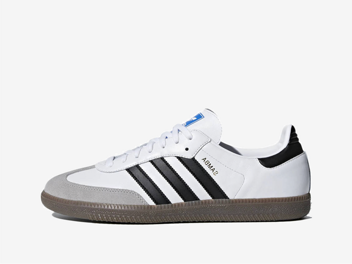 Classic Adidas sneakers in a white and black colourway.