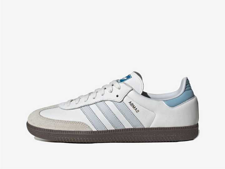 Classic Adidas sneakers in a white and blue colourway.