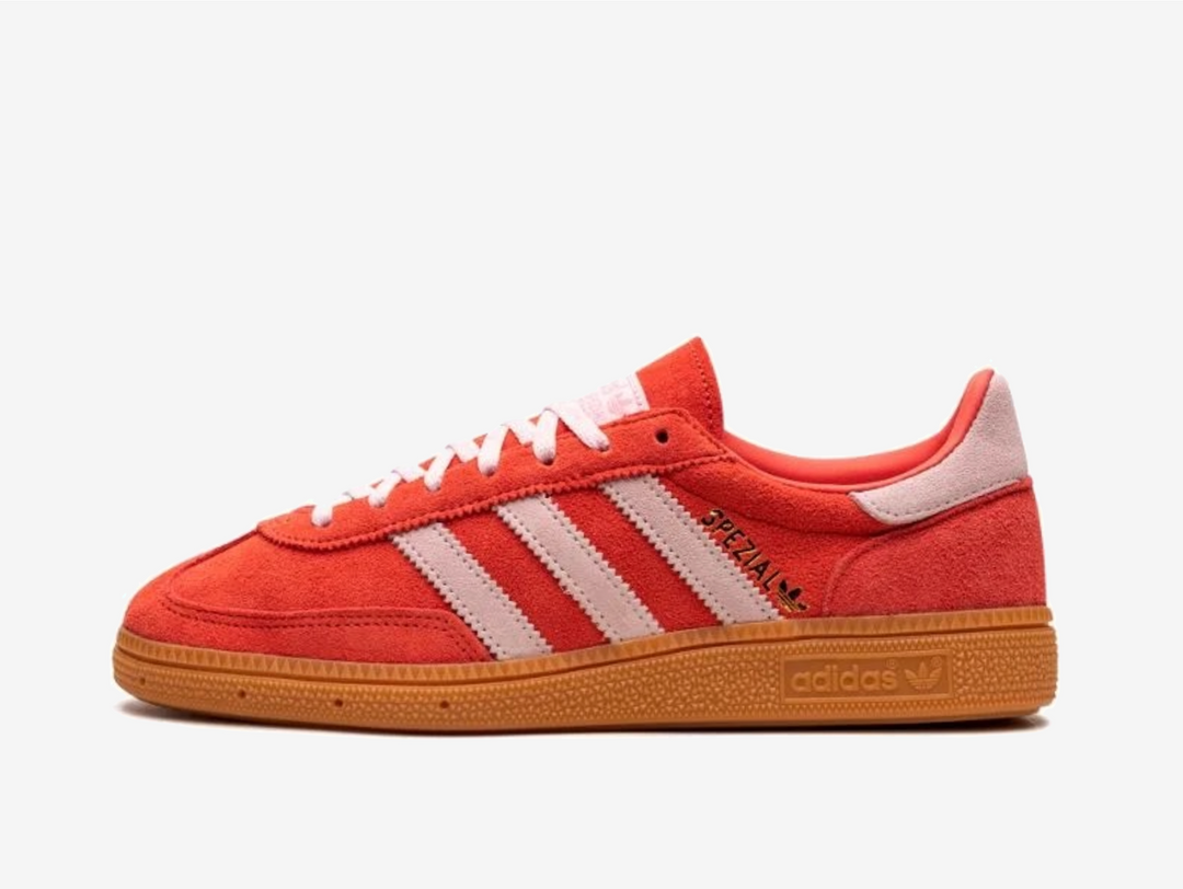 Exclusive Adidas sneakers in a red and pink colourway.