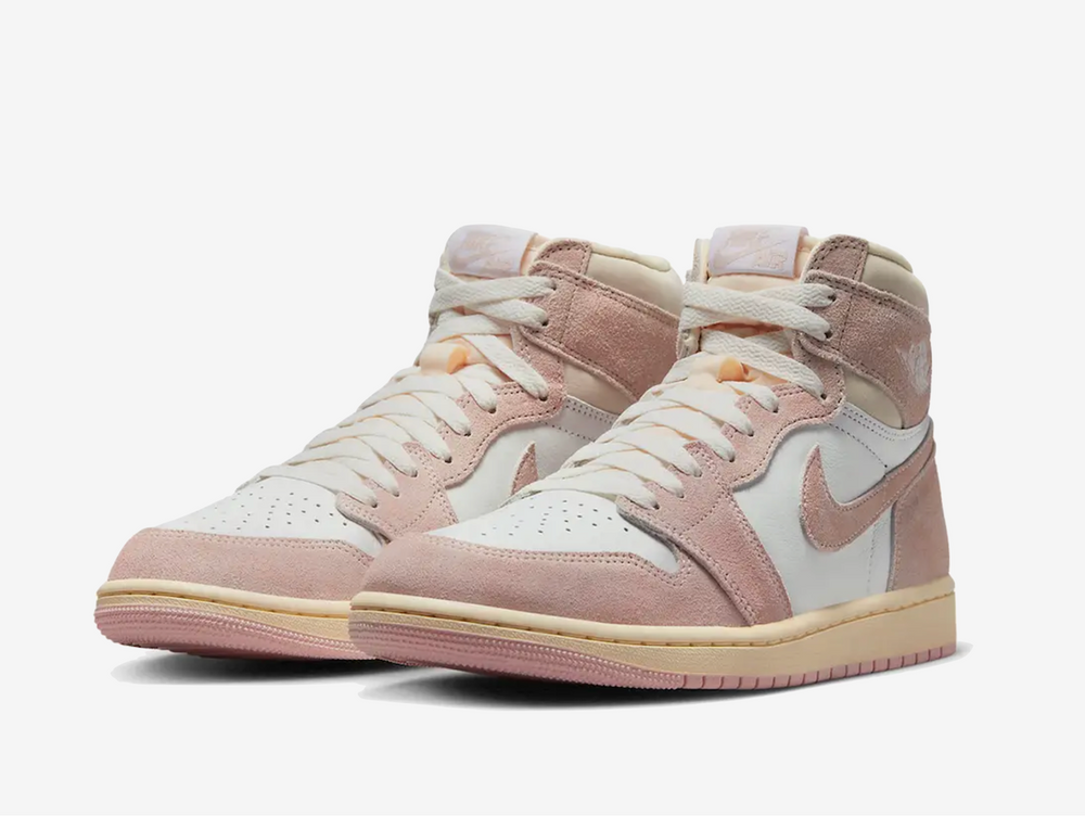 Exclusive Jordan 1 sneakers in a pink and white colourway.