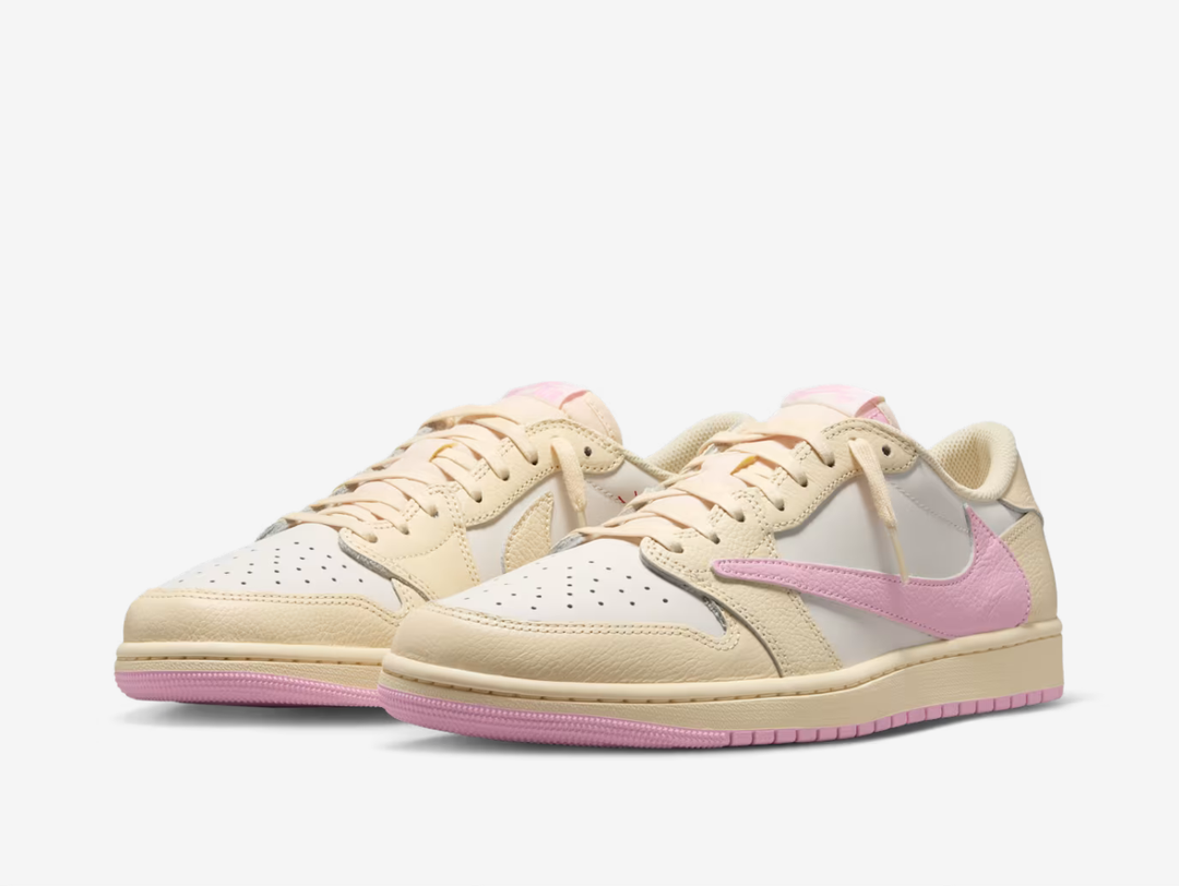 This quintessential sneaker features a soft pink underlay with a vibrant red reverse Swoosh on the lateral sidewall for a pop of colour. A clean off-white tone envelops the smooth leather overlays, establishing a fresh colour blocking similar to the grail-worthy “Reverse Mocha” edition from 2022. The classic Nike Air label adorns the nylon tongue, complementing the “Cactus Jack” label on the medial quarter and co-branded graphics on the insole.