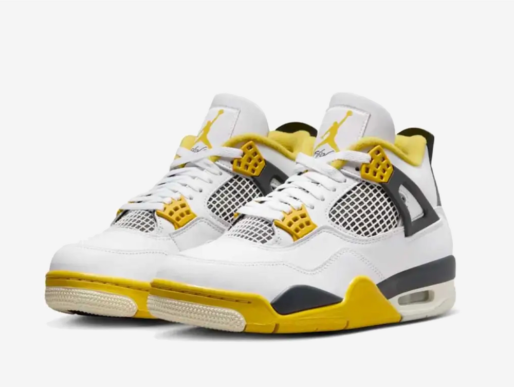 Exclusive Jordan 4 sneakers in a white, yellow and black colour scheme.