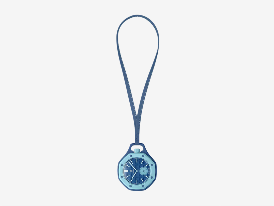 The LAN BA pocket watch features a blue dial with a tapisserie effect, hour markers and hands coated in Grade A Super-LumiNova® (blue emission), and a light blue petite seconde subdial. It has a sapphire crystal that offers enhanced scratch resistance and features an anti‑reflective coating. Reminiscent of AP's Royal Oak collection, it has a light blue octagonal bezel and crown made from Bioceramic and eight blue hexagonal Bioceramic screws welded to the case.
