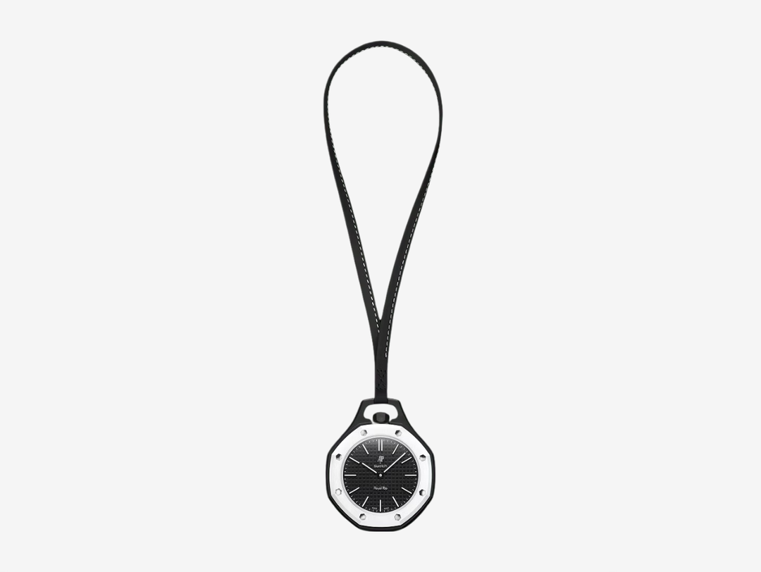 The OCHO NEGRO pocket watch features a black dial with a tapisserie effect, as well as hour markers and hands coated in Grade A Super-LumiNova® (blue emission). It has a sapphire crystal that offers enhanced scratch resistance and features an anti‑reflective coating. Reminiscent of AP's Royal Oak collection, it has a white octagonal bezel and a black crown made from Bioceramic and eight black hexagonal Bioceramic screws welded to the case. 