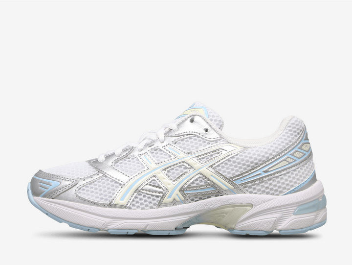 Exclusive Asics Gel 1130 sneakers in a white, silver and blue colour scheme. Featuring breathable mesh and metallic overlays.