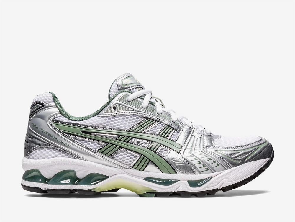 The synthetic leather overlays are mostly metallic silver except on the ASICS Tiger Stripes on both the medial and lateral mid-panels which are soft olive-looking Green. This greyish Green colour repeats on the mesh sock liner and insole and the tongue tab accents. Cream-coloured ASICS branding stands out on the silver tongue tab and the insole. A white midsole with Green GEL inserts and a Green and black rubber outsole finish off the style of this shoe.