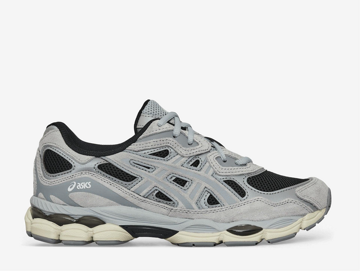 The Asics Gel-NYC Black Piedmont Grey blends early 2000s running design with modern performance. The upper combines breathable mesh with synthetic and suede overlays, giving both structure and ventilation. Inspired by classic models like the Gel-Nimbus 3 and Gel-MC Plus V, it sits on Gel-Cumulus 16 tooling for a retro yet updated look. GEL cushioning and lightweight foam in the midsole provide comfort and support for everyday wear. 