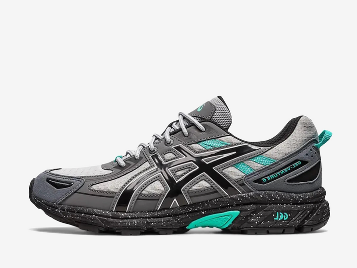 Exclusive Asics sneakers in a grey and aqua green colour scheme.