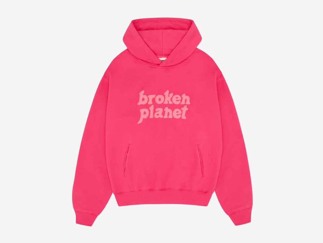 Exclusive Broken Planet Hoodie in a bright pink colour scheme with puff print details.