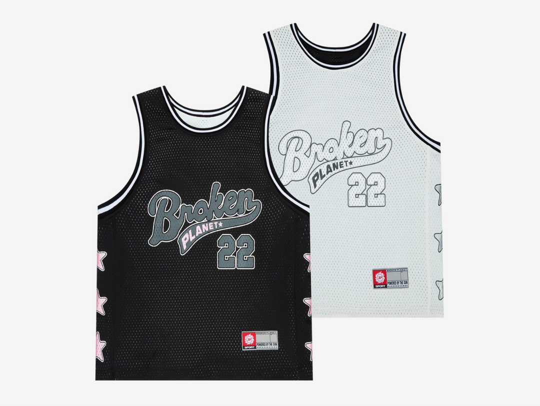 Elevate your streetwear or game-day fit with the Broken Planet Reversible Mesh Basketball Jersey. Made from breathable, recycled polyester mesh, it keeps you cool on and off the court. Switch between two looks — sleek Midnight Black on one side, crisp Snow White on the other. Finished with metallic print logos and a premium woven label for authentic Broken Planet style.
