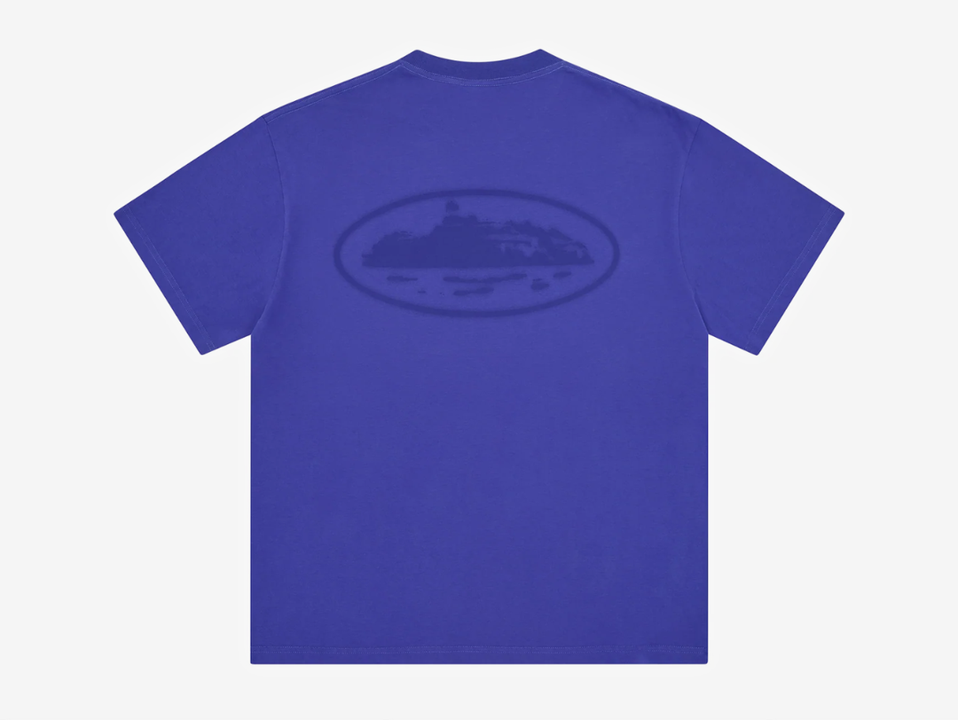 Blue Corteiz cut-and-sewn cotton T-shirt featuring a vintage Island Knockout graphic on the left chest and a larger matching print across the centre back.