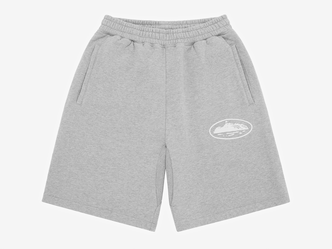 The Corteiz Island Puff Print Sweatshort in Heather Grey features a relaxed everyday fit with signature puff print branding for a clean but elevated finish. Crafted from heavyweight cotton-rich fleece, the shorts offer a soft brushed interior and structured feel, making them ideal for both casual wear and comfort. Finished with an elasticated waistband, adjustable drawcord, and side pockets for practicality. Made from a premium cotton and polyester blend with an approximate 440 GSM heavyweight construction.