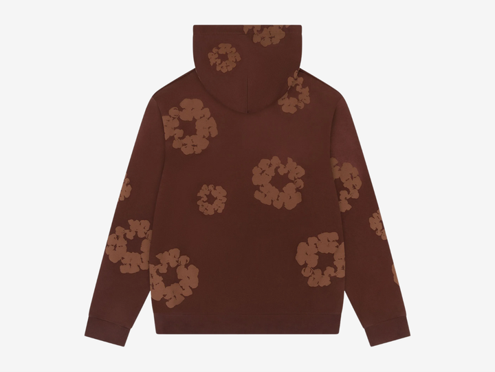 The Denim Tears Cotton Wreath Hoodie in Monochrome Brown blends cultural storytelling with elevated streetwear. Made from heavyweight cotton fleece, it offers a soft yet structured feel for everyday wear. The tonal Cotton Wreath graphic delivers a refined statement, finished with a relaxed fit, ribbed trims, and a classic kangaroo pocket for timeless comfort and style.