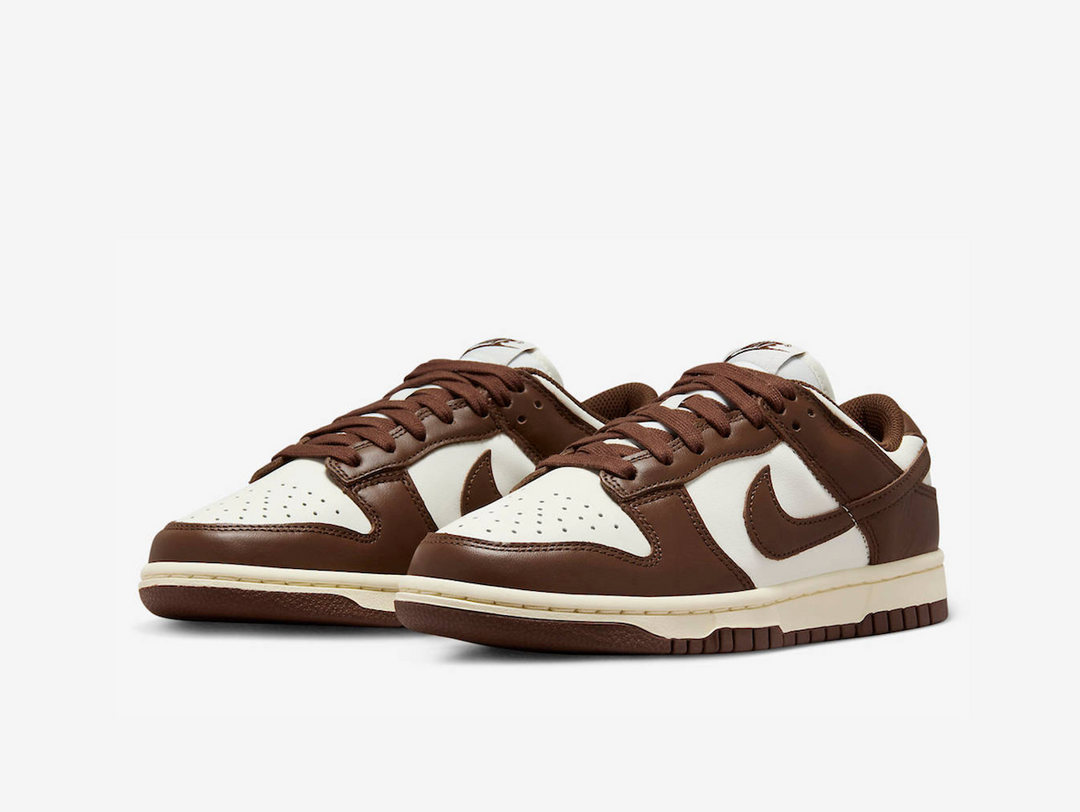 Timeless Dunk Low sneakers in a classic brown and white colour scheme.