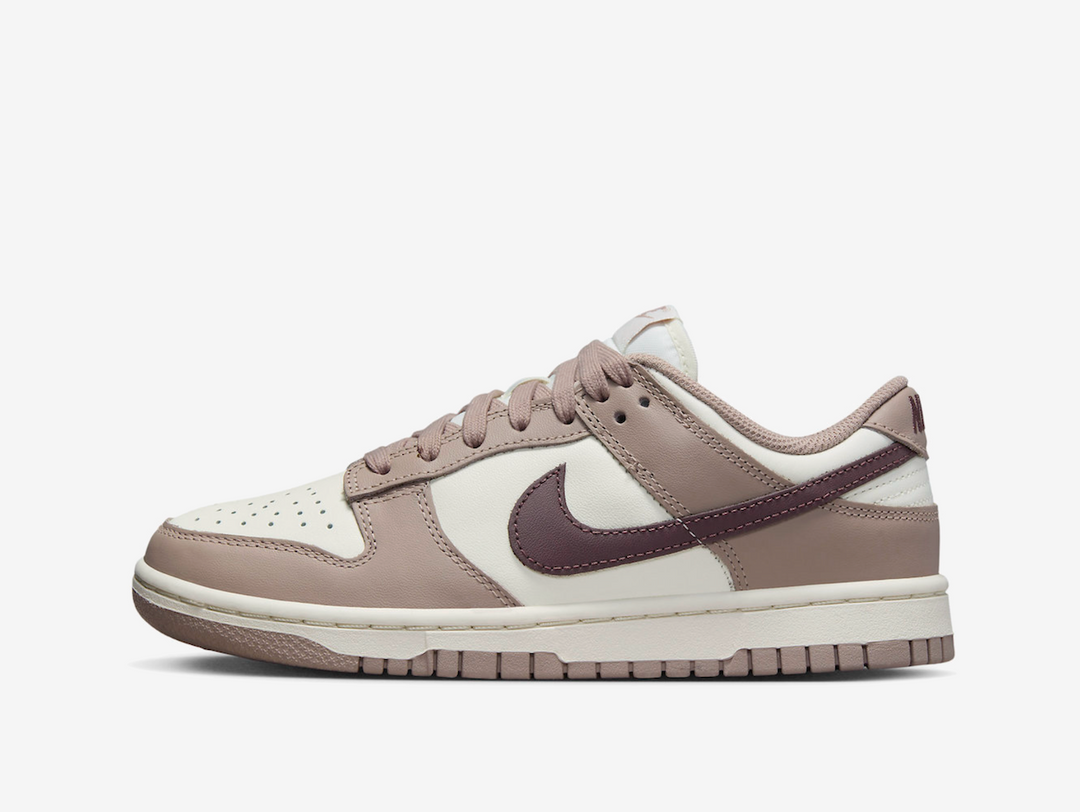 Timeless Nike Dunk sneakers in a beige, brown and white colourway.