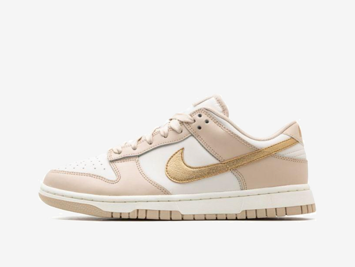 Exclusive Nike Dunk shoes with a unique golden colour scheme.