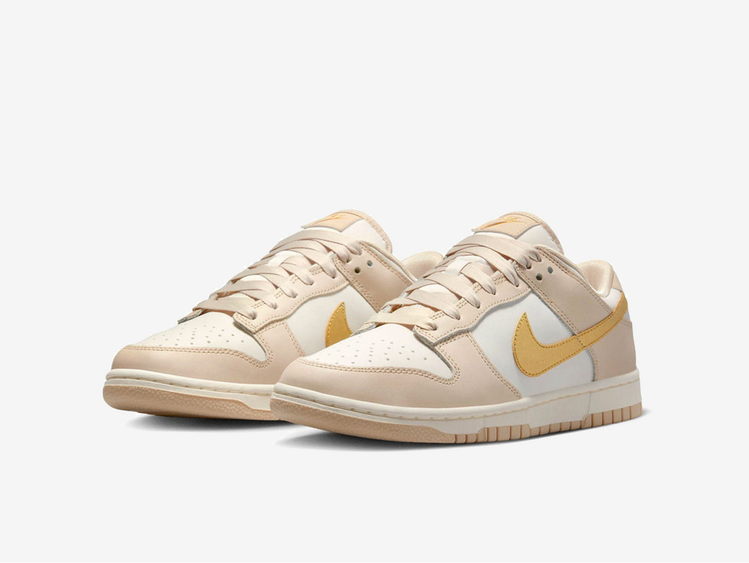 Exclusive Nike Dunk shoes with a unique golden colour scheme.