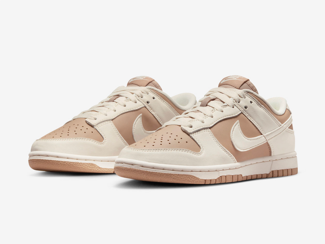 Classic Nike Dunk shoes with a white and brown colourway.