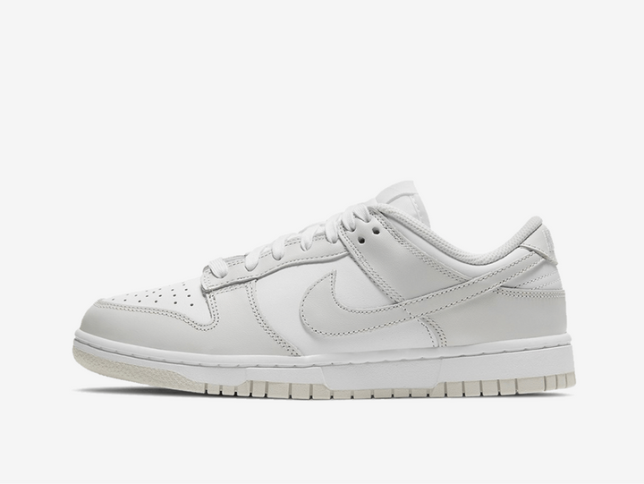 Timeless Nike Dunk sneakers in a classic white and grey colour scheme.