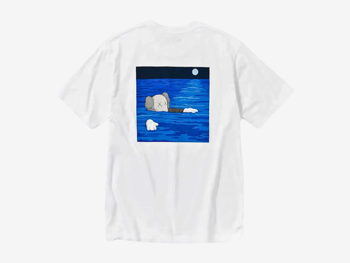 The KAWS x Uniqlo UT Short Sleeve Artbook Cover T-Shirt (US Sizing) White is a collaborative top from the UT lineup released as part of the Fall/Winter 2023 ‘FW23’ collection.

This KAWS x Uniqlo t-shirt is available in white and has a short-sleeved round neck design. The highlight of this tee is the different versions of KAWS artwork at the front and back. The front features a one-pointed companion floating on the surface, while the back features a print of KAWS' new art book cover design.