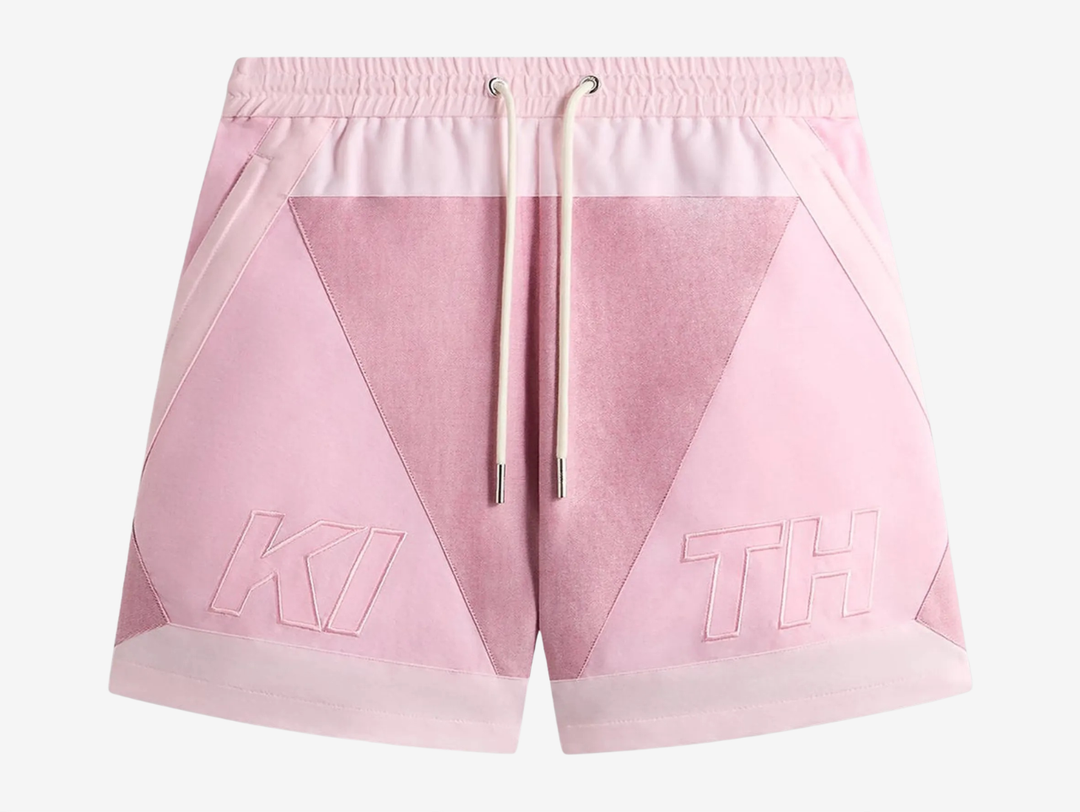 Kith Oxford Turbo Shorts in Mauve Glow, featuring a lightweight premium construction, relaxed fit, elasticated waistband, functional side pockets, and subtle Kith branding. Finished in a soft mauve colourway for versatile everyday wear and elevated streetwear styling.