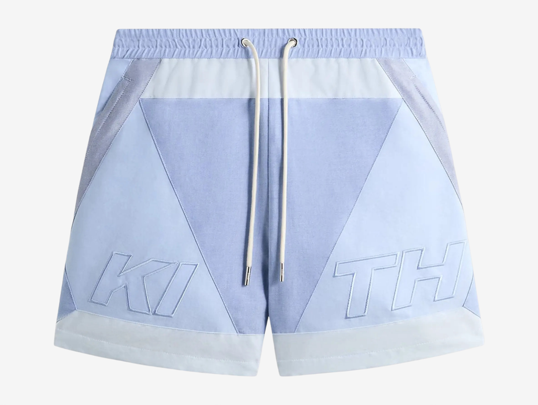 Kith Oxford Turbo Blue Shorts featuring a vibrant turbo blue colourway, lightweight premium construction, elasticated waistband, side pockets, and subtle Kith branding. Designed with a relaxed fit for everyday comfort and versatile streetwear styling.