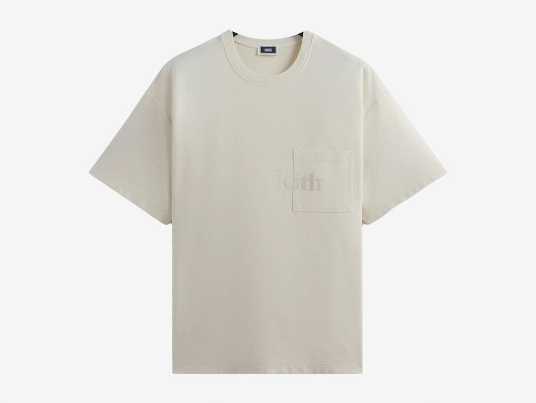 The Kith Quinn Tee is made from a premium 280GSM cotton fabric, garment-dyed and washed for a high-low color effect. It has Kith serif branded artwork printed across the left chest, and slit detailing at the side seams.