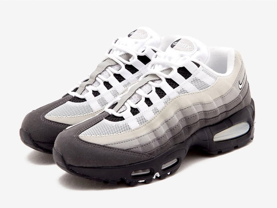 The Air Max 95 OG Big Bubble “Granite” revives a foundational colorway with modern upgrades, dressing the iconic silhouette in layered shadow tones. Black and medium ash sweep across the gradient panels, while dark pewter accents add depth. The updated Big Bubble cushioning enhances comfort and nostalgia, balancing functional minimalism with heritage design. Its restrained palette lets the layered construction shine, delivering a versatile lifestyle shoe that proves sport-inspired classics never fade.