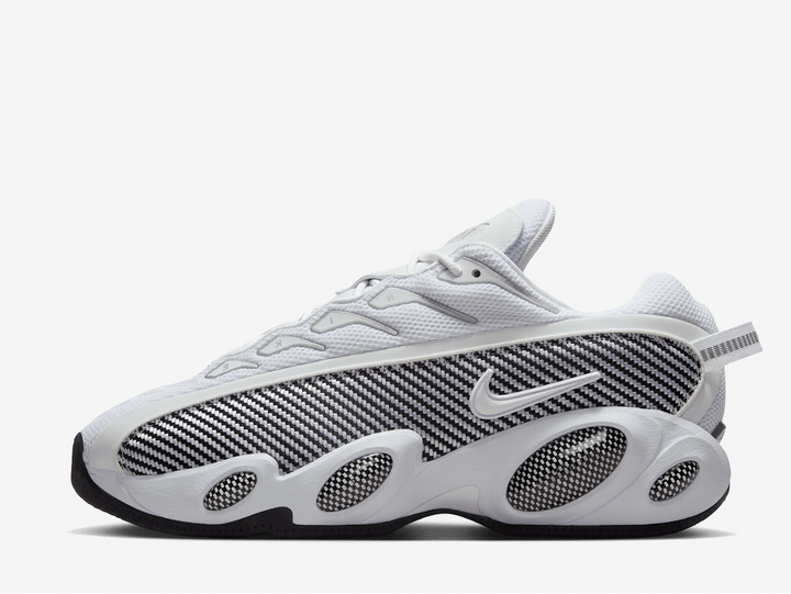 This latest edition sports a White/Black/University Gold colourway, echoing OG carbon-fibre styles from the mid-’90s. A mesh upper keeps it breathable, while those signature “bug-eye” pods along the sculpted foam midsole bring instant throwback energy. The black-and-white grid overlay channels the vibe of Penny Hardaway-era hardwood heat, with hits of gold underfoot giving it that final NOCTA flourish.