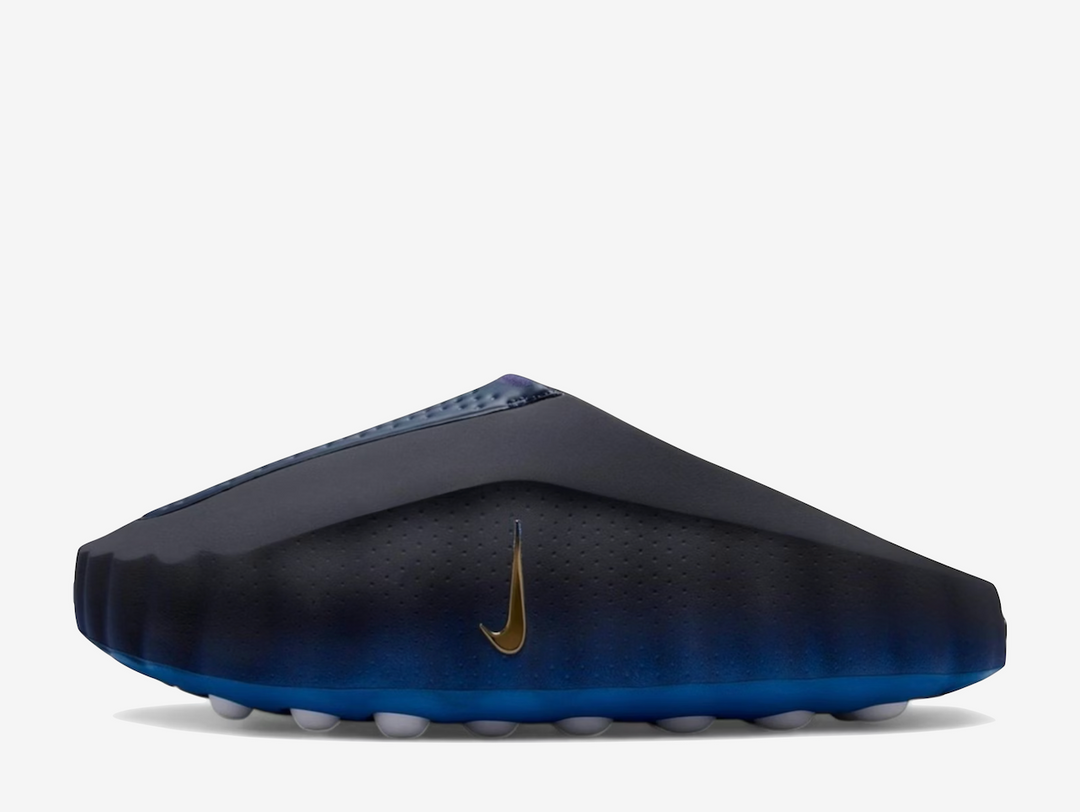 Designed to rewire your focus before the first whistle, the Nike Mind 001 "Blackened Blue" is more than footwear, it's a pre-game ritual for the senses. With a bold blackened blue colourway grounded by metallic copper accents and white detailing, this shoe pushes beyond performance into perception, built to activate your mind before your body moves. At its core, 22 outsole nodes pulse against your foot with every step, engaging sensory pathways to sharpen presence and deepen your connection to the moment.
