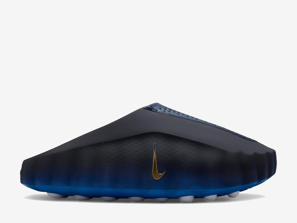 Designed to rewire your focus before the first whistle, the Nike Mind 001 "Blackened Blue" is more than footwear, it's a pre-game ritual for the senses. With a bold blackened blue colourway grounded by metallic copper accents and white detailing, this shoe pushes beyond performance into perception, built to activate your mind before your body moves. At its core, 22 outsole nodes pulse against your foot with every step, engaging sensory pathways to sharpen presence and deepen your connection to the moment.