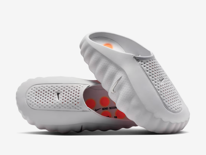 The Nike Mind is designed to enhance focus and awareness before the game, using 22 responsive outsole nodes to deliver sensory feedback with every step. Developed by Nike’s Mind Science Department, it combines innovative mental-performance design with soft foam cushioning, a flexible footbed, durable rubber traction, and a breathable knitted tongue for all-day comfort and control.