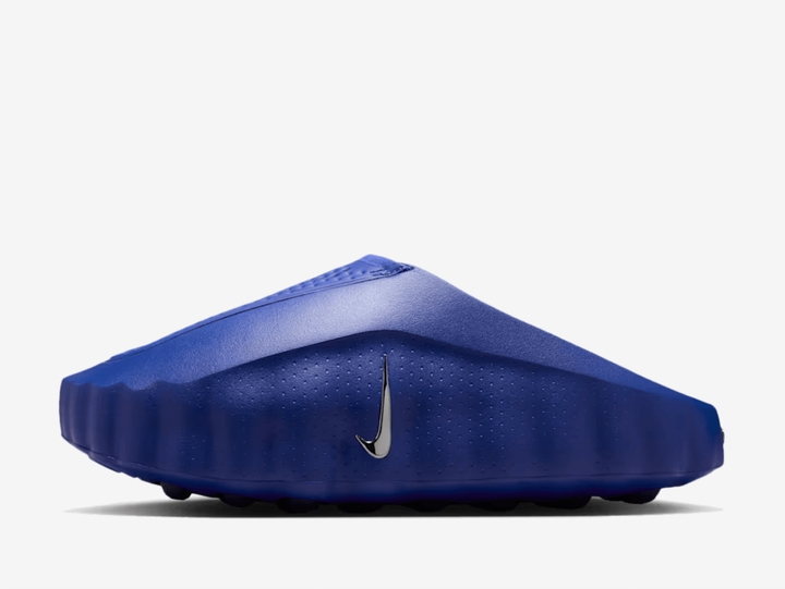 The Nike Mind 001 Old Royal features a bold blue finish across its streamlined slip-on upper, complemented by subtle contrasting details and Nike’s distinctive sculpted design. Underfoot, Nike’s Mind sole system uses individually moving nodes for a unique feel with every step, while soft cushioning and breathable materials keep the pair comfortable for everyday wear.