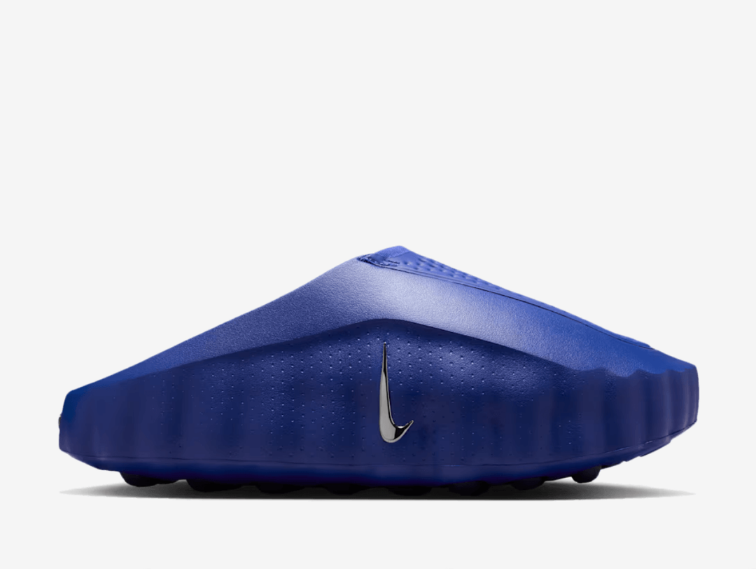 The Nike Mind 001 Old Royal features a bold blue finish across its streamlined slip-on upper, complemented by subtle contrasting details and Nike’s distinctive sculpted design. Underfoot, Nike’s Mind sole system uses individually moving nodes for a unique feel with every step, while soft cushioning and breathable materials keep the pair comfortable for everyday wear.