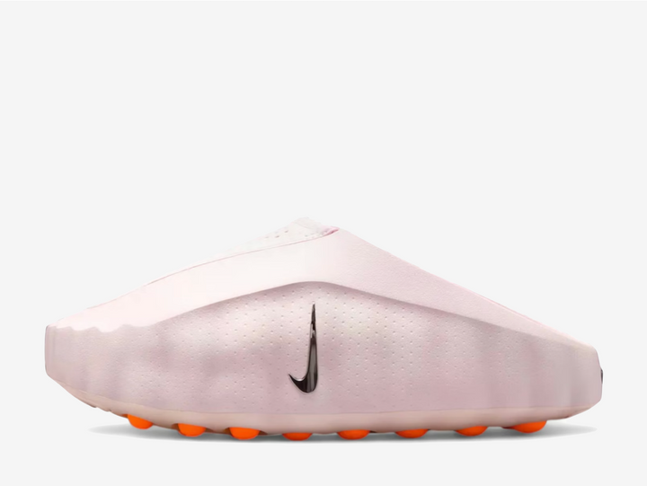 Born from the experimental Mind series, the Mind 001 "Pearl Pink" blends sensory innovation with sleek slip-on design in a soft pastel refresh. The moulded upper delivers a clean, minimalist shape with perforations across the vamp revealing glowing interior details, while a small metallic Swoosh at the midfoot adds subtle contrast. Built with neuroscience-inspired design at its core, the standout podded outsole features bright orange nodes arranged in a grid layout, creating gentle stimulation underfoot.