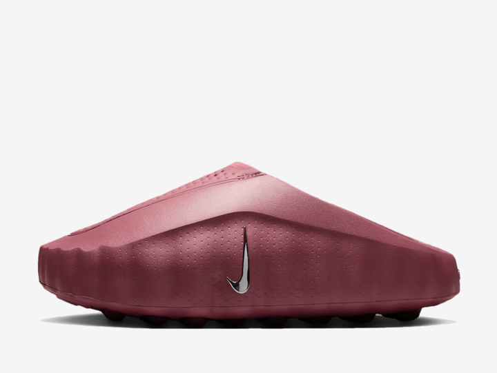The Nike Mind 001 Mystic Dates features a sleek slip-on design finished in rich purple tones, paired with subtle contrasting details and a sculpted futuristic shape. Underfoot, Nike’s Mind sole system uses individually moving nodes for a distinctive feel with every step, while soft cushioning and breathable materials provide everyday comfort.
