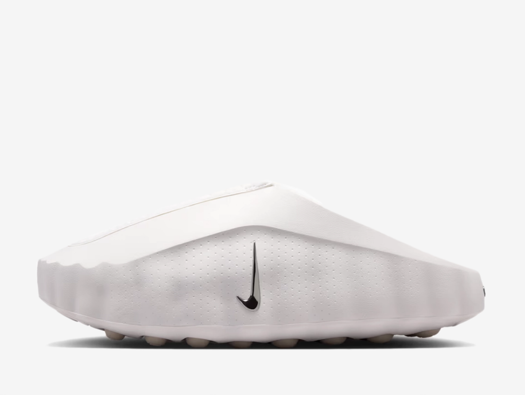 The Nike Mind 001 Summit White features a clean slip-on design finished in soft neutral tones, with subtle Swoosh detailing and a sculpted futuristic shape.
Underfoot, Nike’s Mind sole system uses individually moving nodes to create a distinctive feel with every step, while soft cushioning and breathable materials provide everyday comfort.

