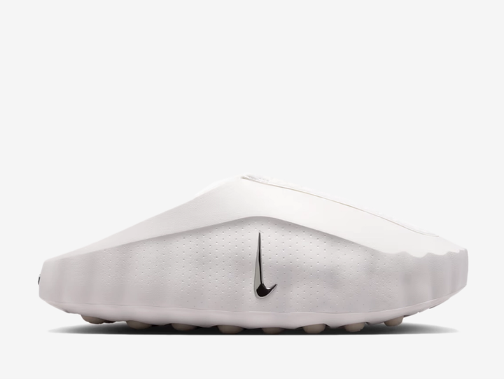 The Nike Mind 001 Summit White features a clean slip-on design finished in soft neutral tones, with subtle Swoosh detailing and a sculpted futuristic shape.
Underfoot, Nike’s Mind sole system uses individually moving nodes to create a distinctive feel with every step, while soft cushioning and breathable materials provide everyday comfort.
