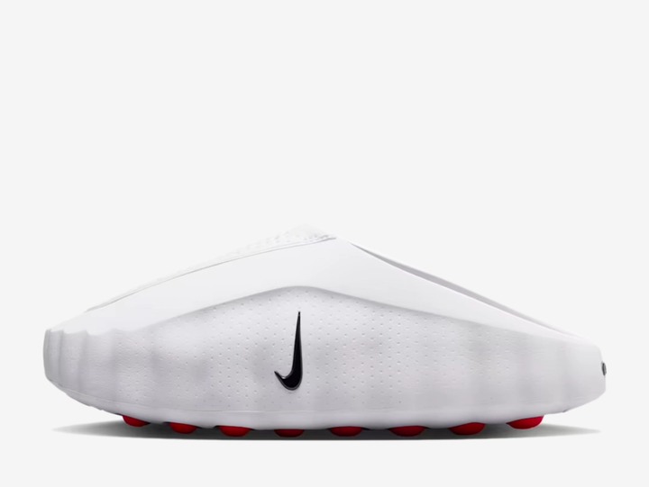 What if you could enhance your pre-game routine with a mind-altering shoe? Meet the Nike Mind. Its large outsole nodes push against your foot as you step, engaging sensory areas of the brain to help you stay present and connect with your surroundings. Because when it's anyone's game, winning is all in the mind.