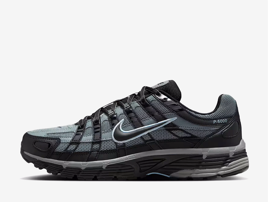 This greyscale P-6000 pairs a grey mesh base with black synthetic overlays for a breathable, lightweight build. A faint blue hue highlights the minimalist “P-6000” branding on the foxing, while Swoosh logos on the forefoot, quarter, and heel tie in with Nike branding on the tongue and Bowerman Series label. A cushioned foam midsole ensures comfort and shock absorption, supported by a durable waffle rubber outsole.